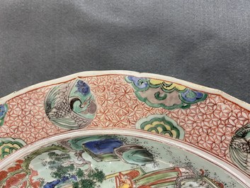 A Chinese famille verte dish with figures in a landscape, Kangxi